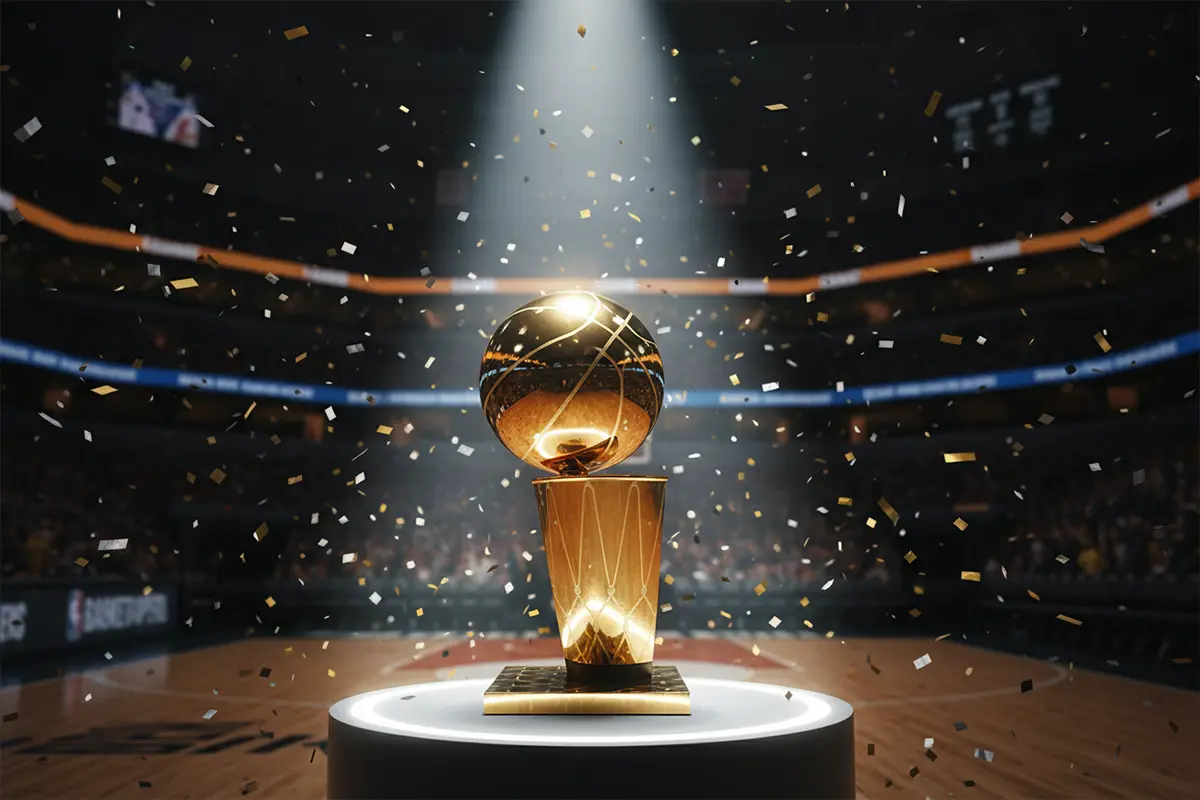 Basketball Saisonwetten – goldener Meisterpokal auf einem beleuchteten Podest in einer Arena
